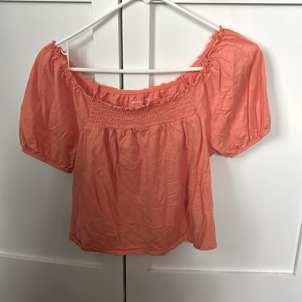 American Eagle coral smocked top with poof sleeves and ruffles size XS